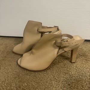 Vince Camuto peep toe sling back heels.